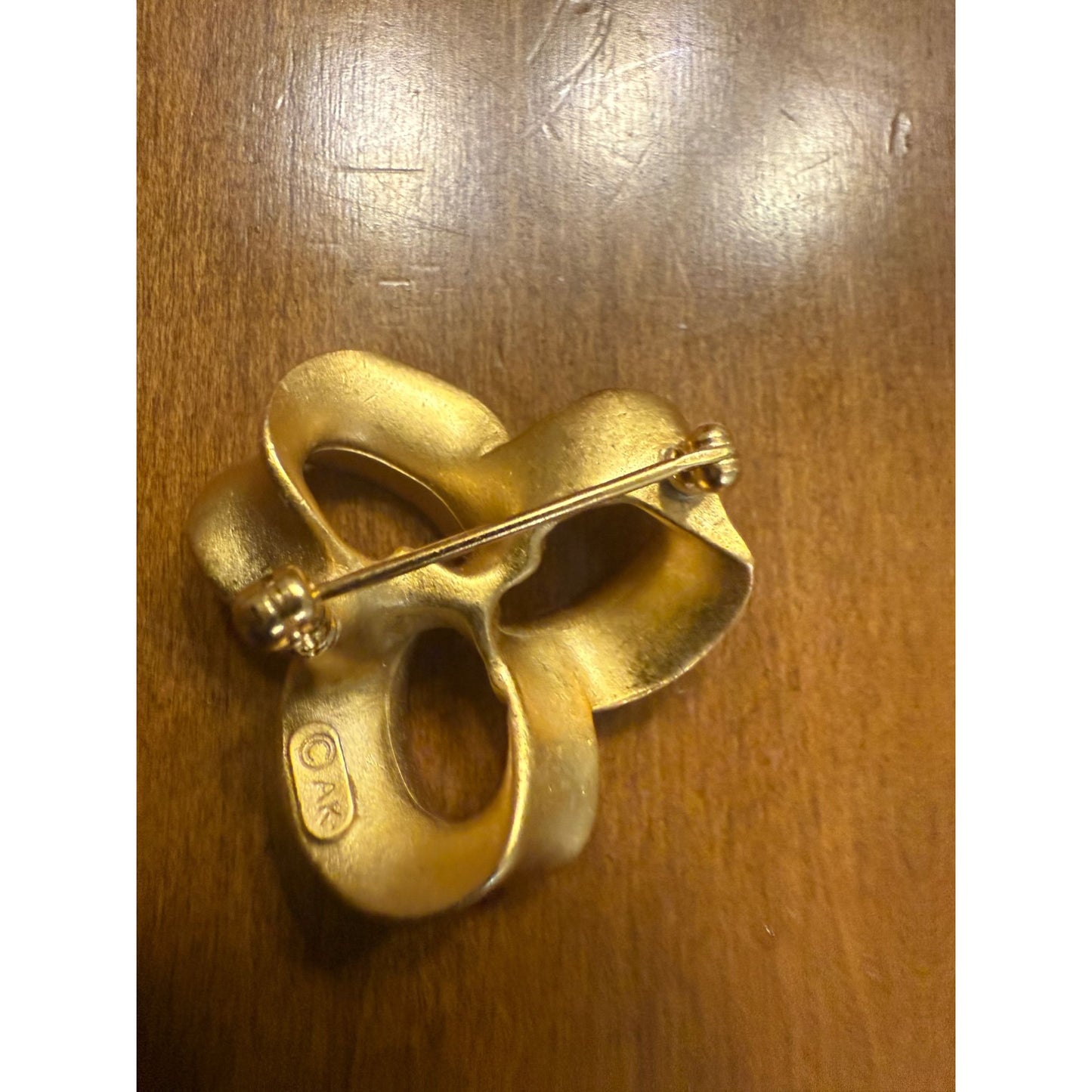 Vintage Anne Klein Gold Tone Ribbon Knot Brooch