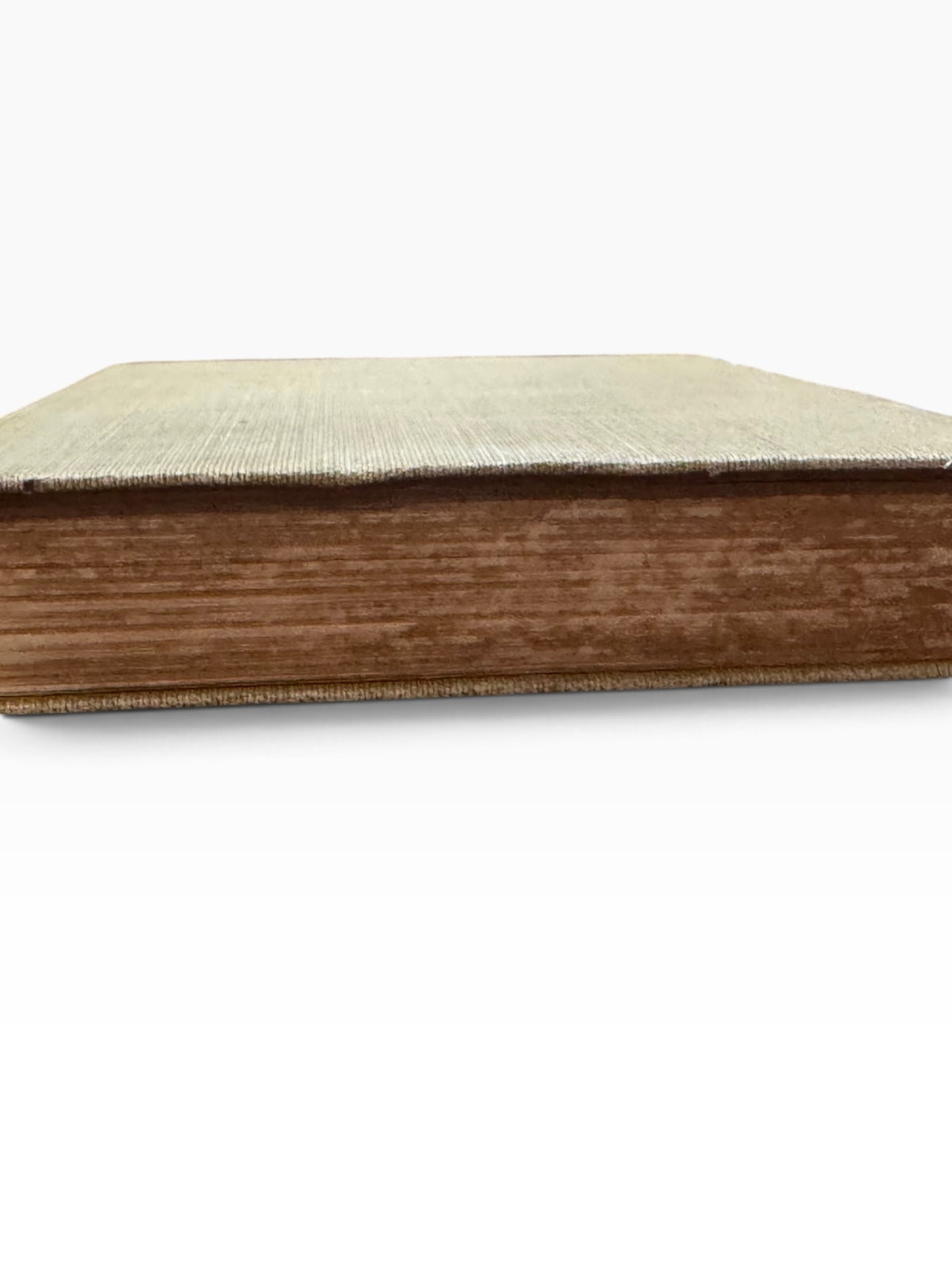 Side view of The Golden Treasury 1911 antique hardcover book showing age-toned page edges and olive-green cloth binding.