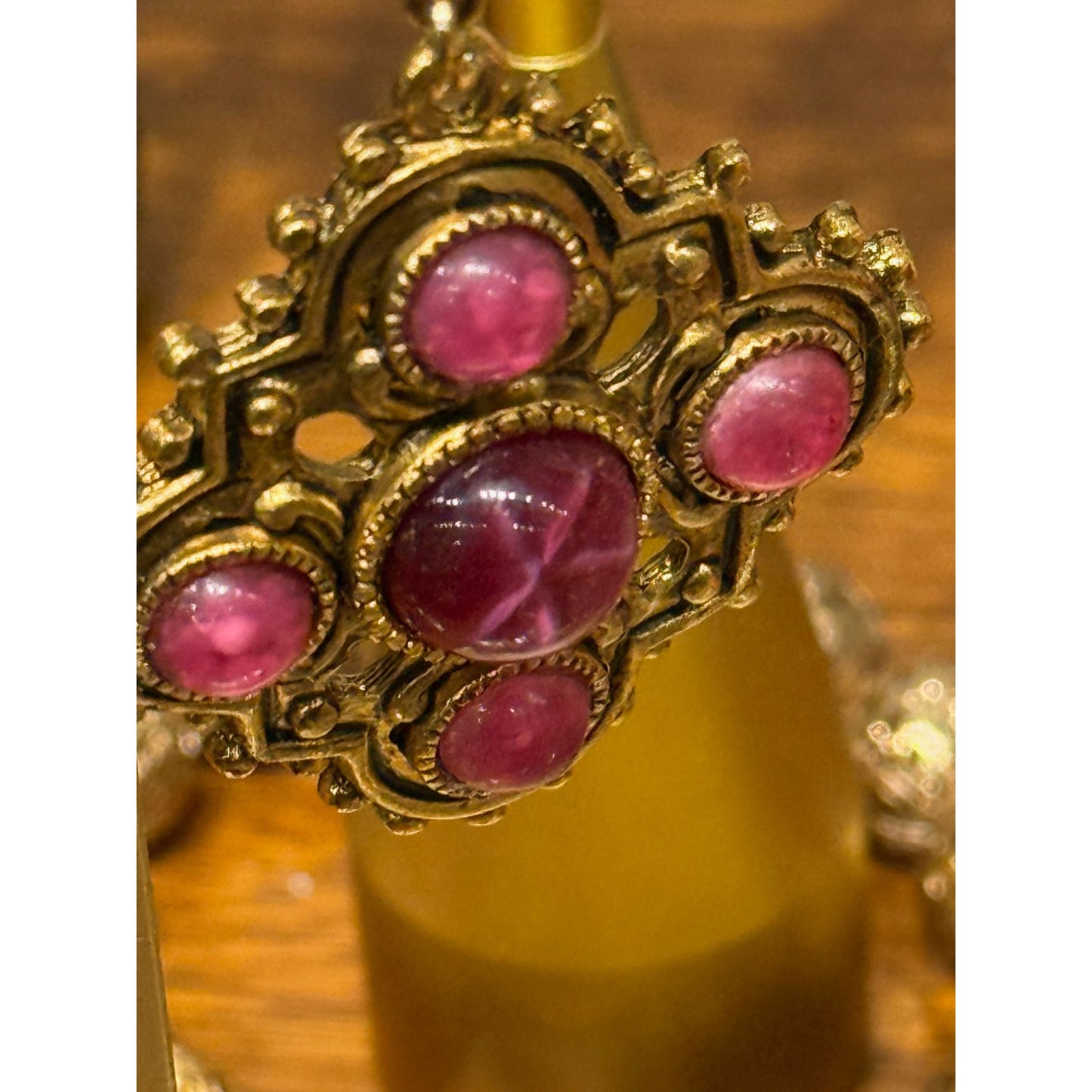 Vintage 1960's Gold Clip-On Earrings With Pink Starburst Cabochon & Ornate Design