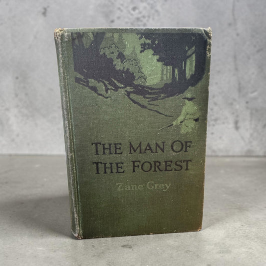 1920 Zane Grey The Man of the Forest first edition book in green pictorial cloth with forest scene cover art