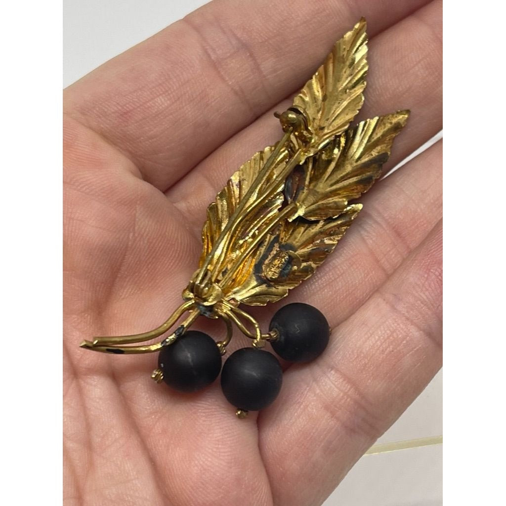 Signed Austrian Made Gold Toned Brooch with Black Enamel and Blue Crystal, Vintage 1950s